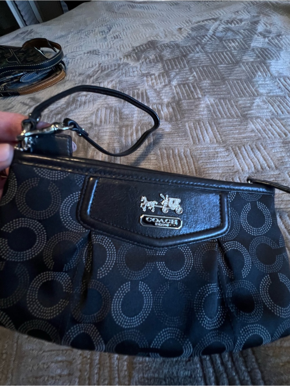 Coach Black Madison Dotted Signature Wristlet with Horse & Carriage Plaque